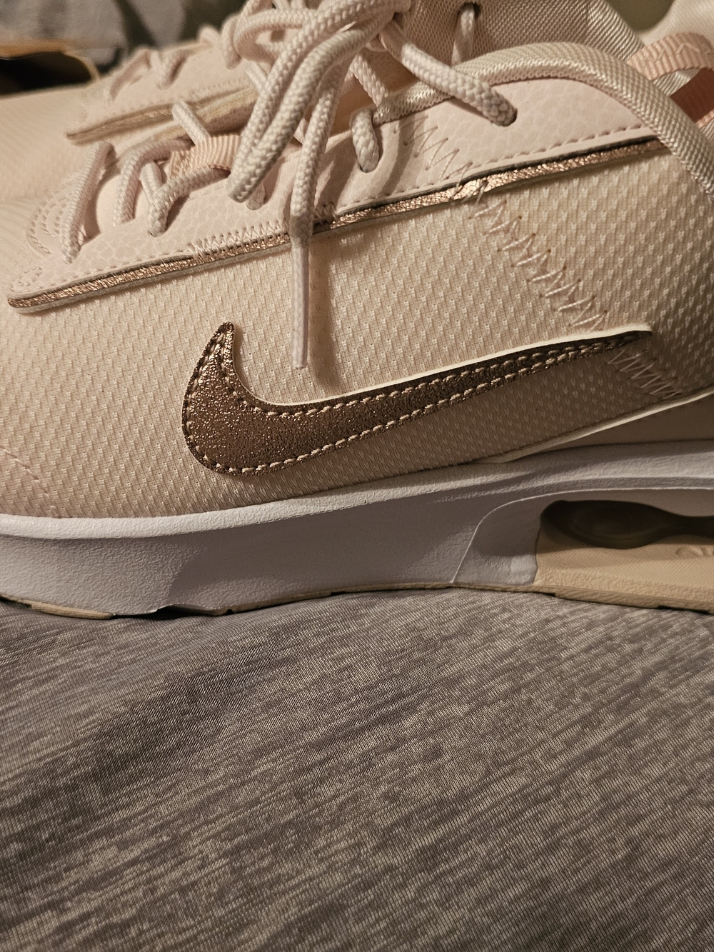 Nike Men’s Pale Pink Sneakers with Rose Gold Swoosh